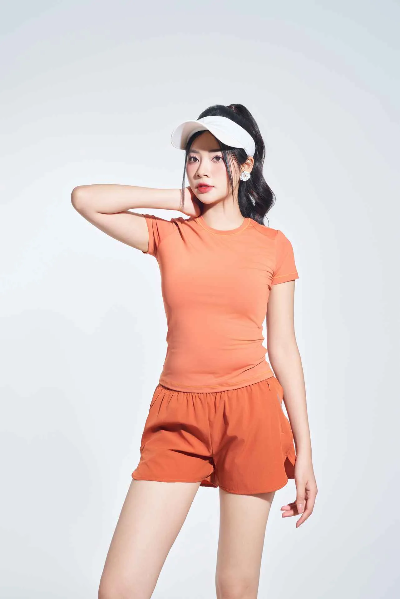 Quần sooc màu cam